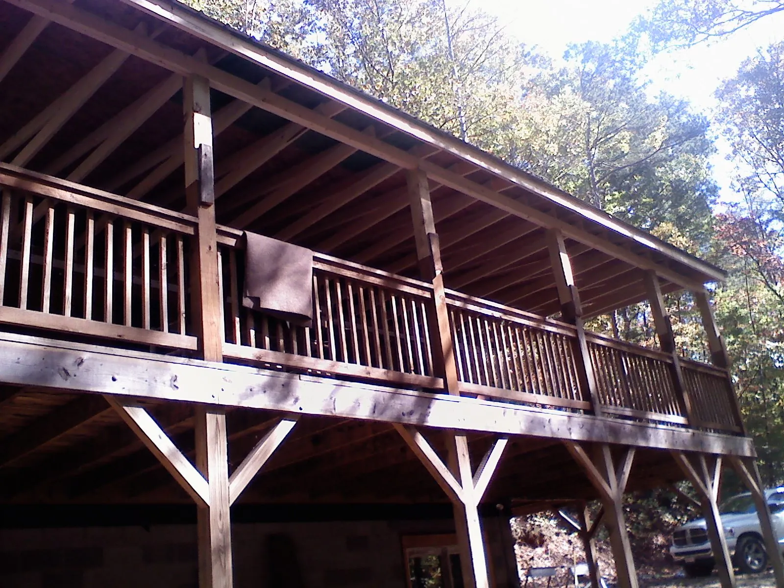 Timber framing under a new elevated porch and deck — Roof Leak Repair in Shortsville by Roofing Brothers